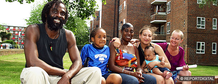 Diverse group with young women with a child and baby in arms